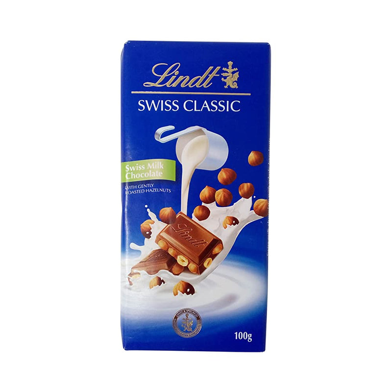Shop Lindt Swiss Classic Milk Chocolate - Roasted Hazelnuts, 100g Carton